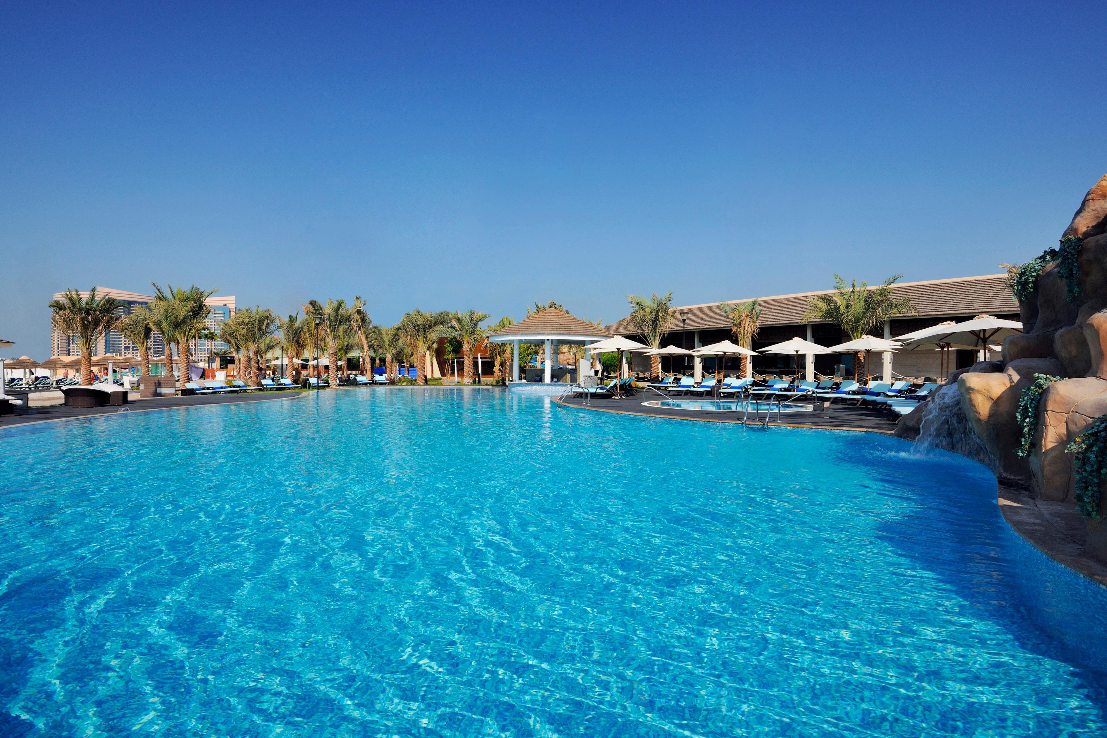 Отель Intercontinental Abu Dhabi By Ihg Экстерьер фото The swimming pool at the resort
